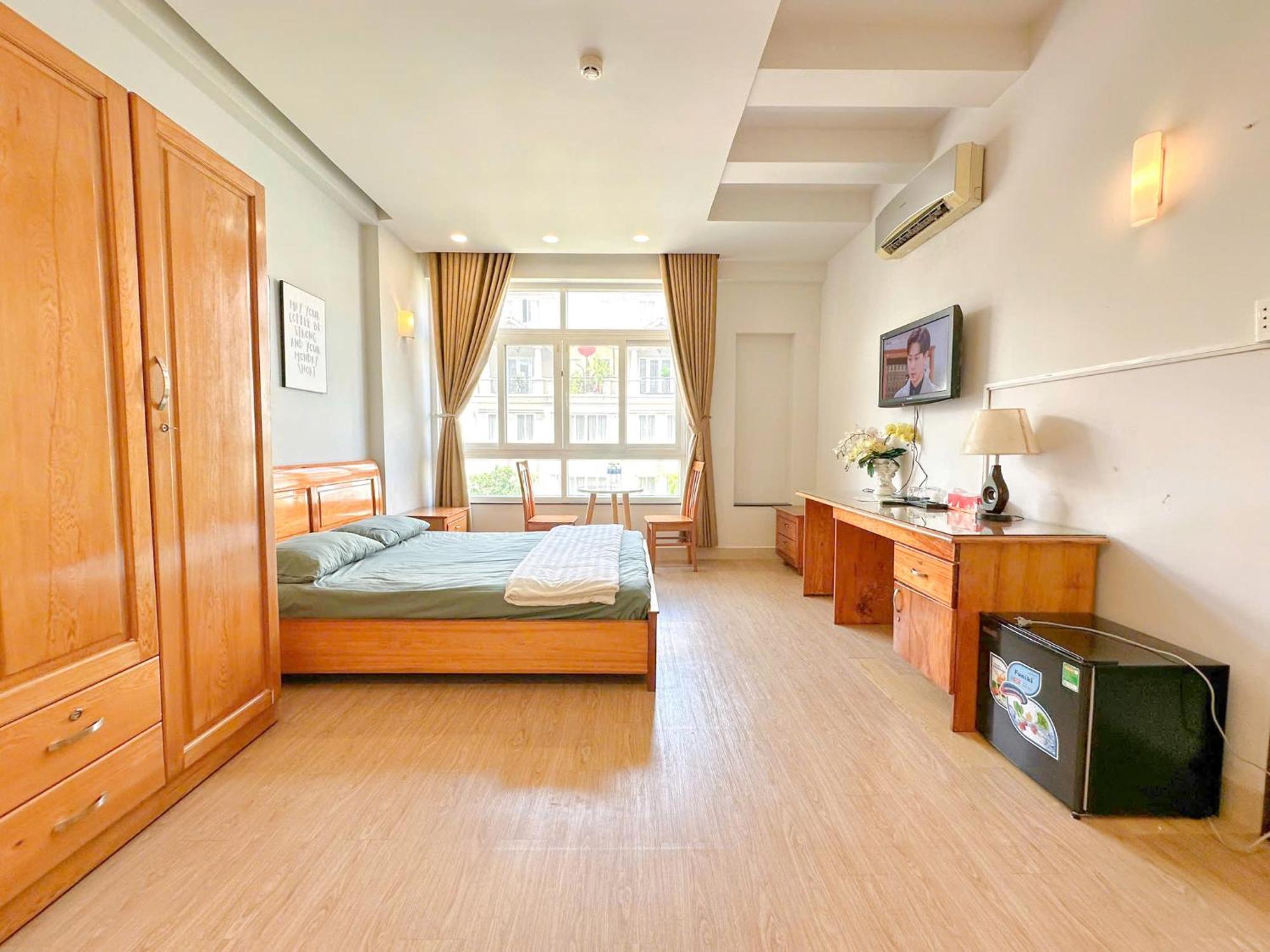 Khách sạn hẻo lánh New Land 2 - Phu My Hung *