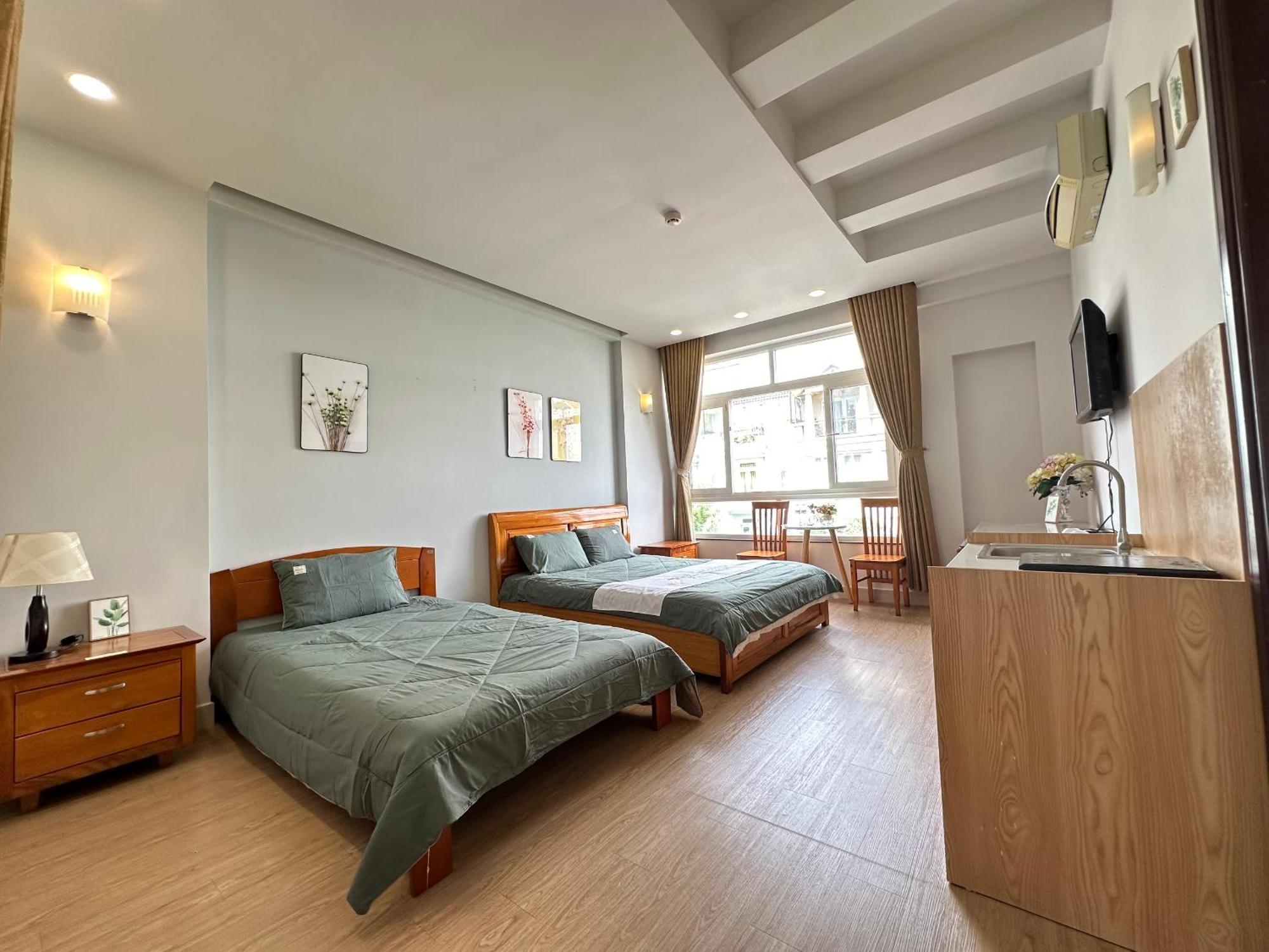 Khách sạn hẻo lánh New Land 2 - Phu My Hung *